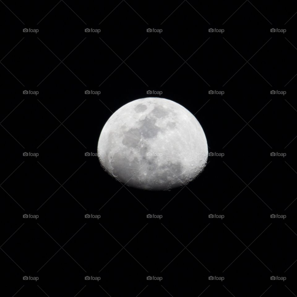 Silver moon lighting the sky