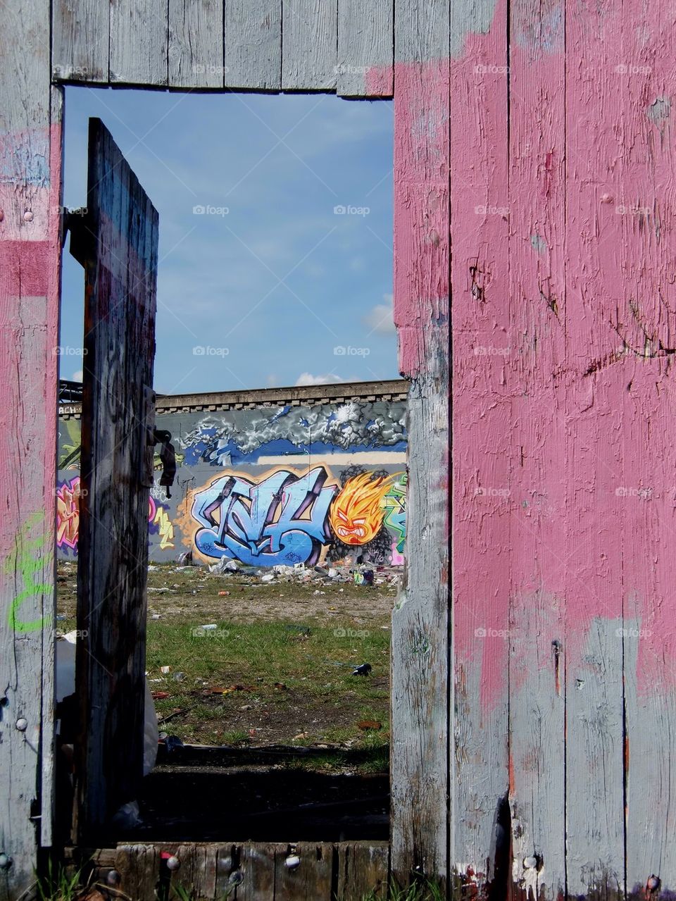 Door to graffiti.