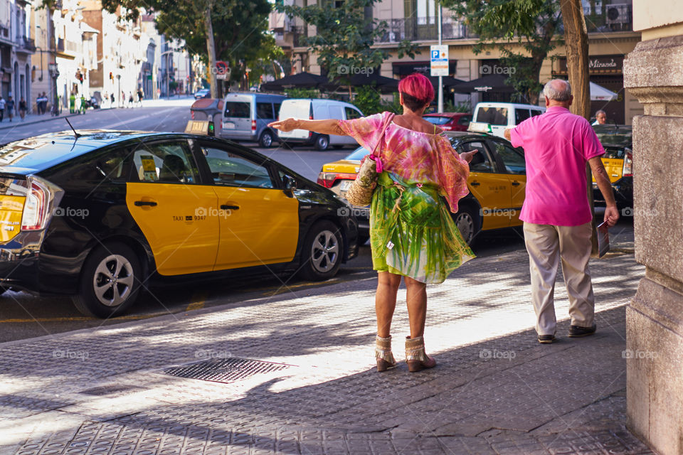 Elderly fashion couple of tourists