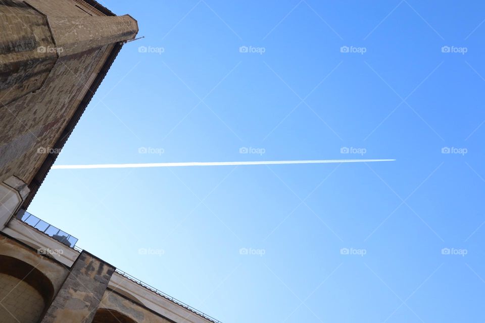 Airplane line on blue sky 