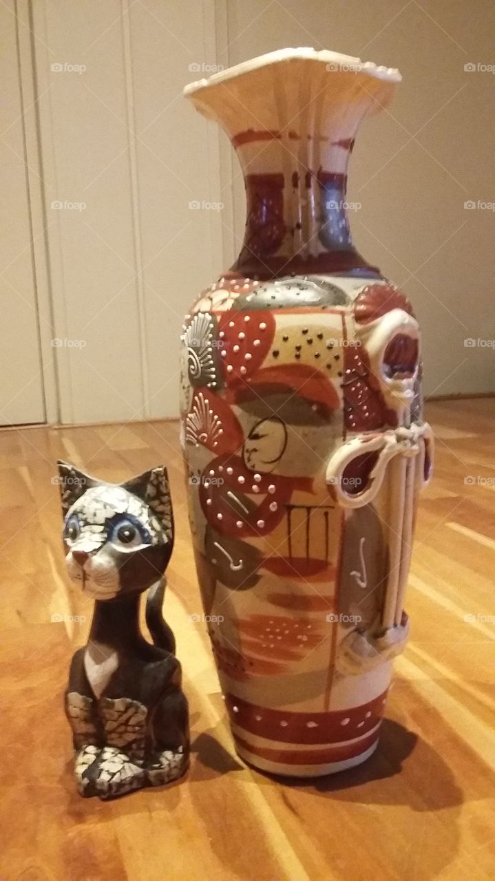 Art vase and a cat. decoration