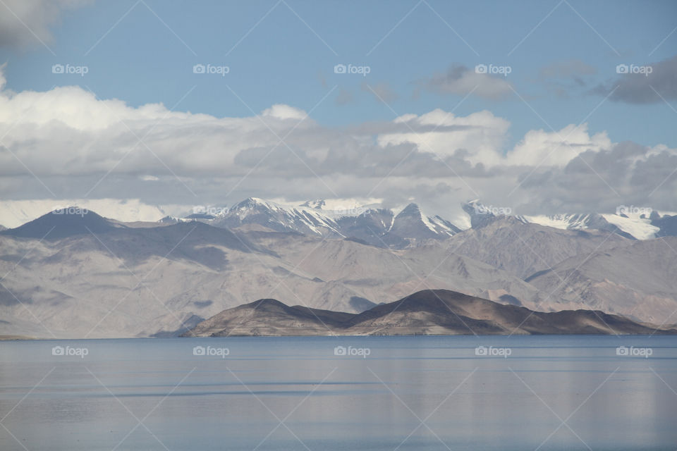 Tajikistan mountain lake pair highway