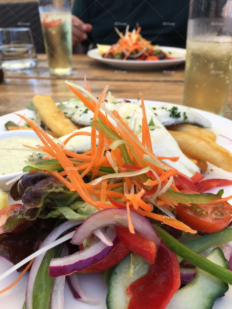 Orange carrot garnish on salad