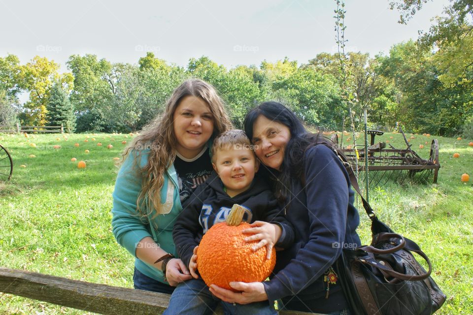 The perfect pumpkin . Day at the farm trying to find the perfect pumpkin