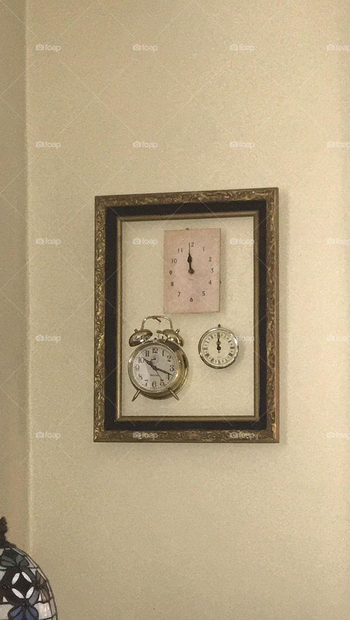 Three different types of clocks together within a frame.