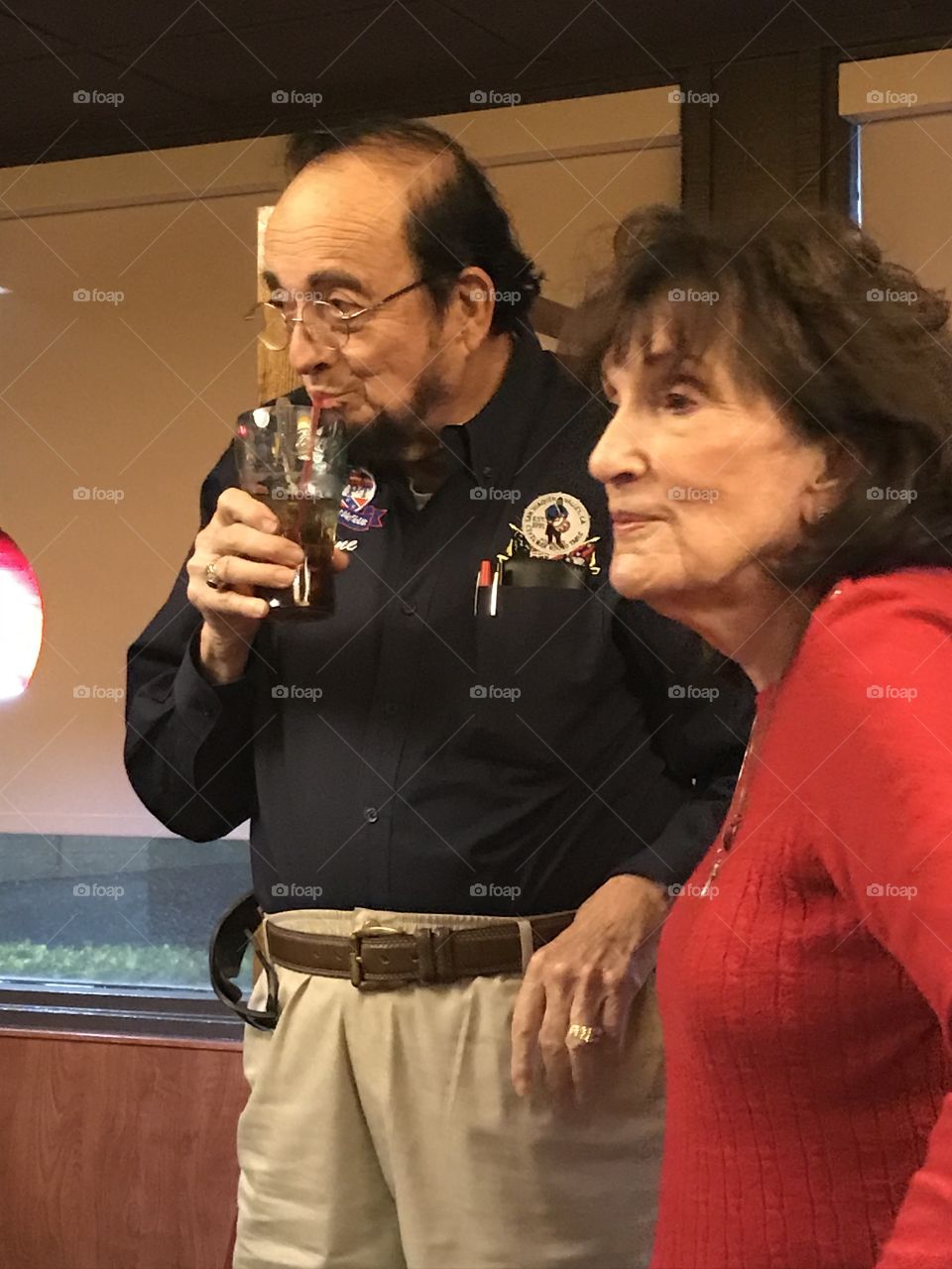 Abe Lincoln having a drink of soda after giving an important speech.