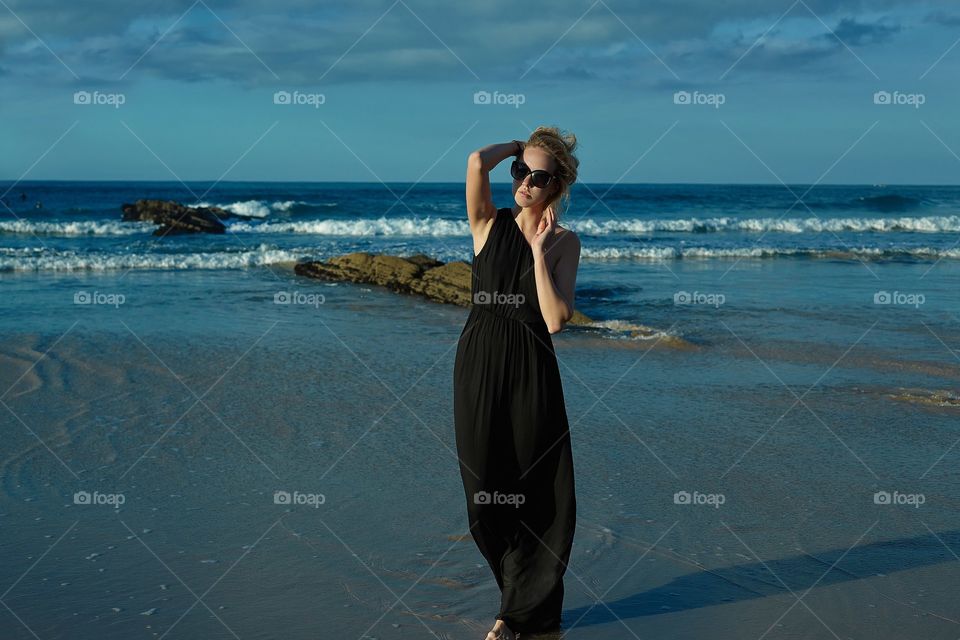 Beautiful woman portrait . Atlantic Ocean