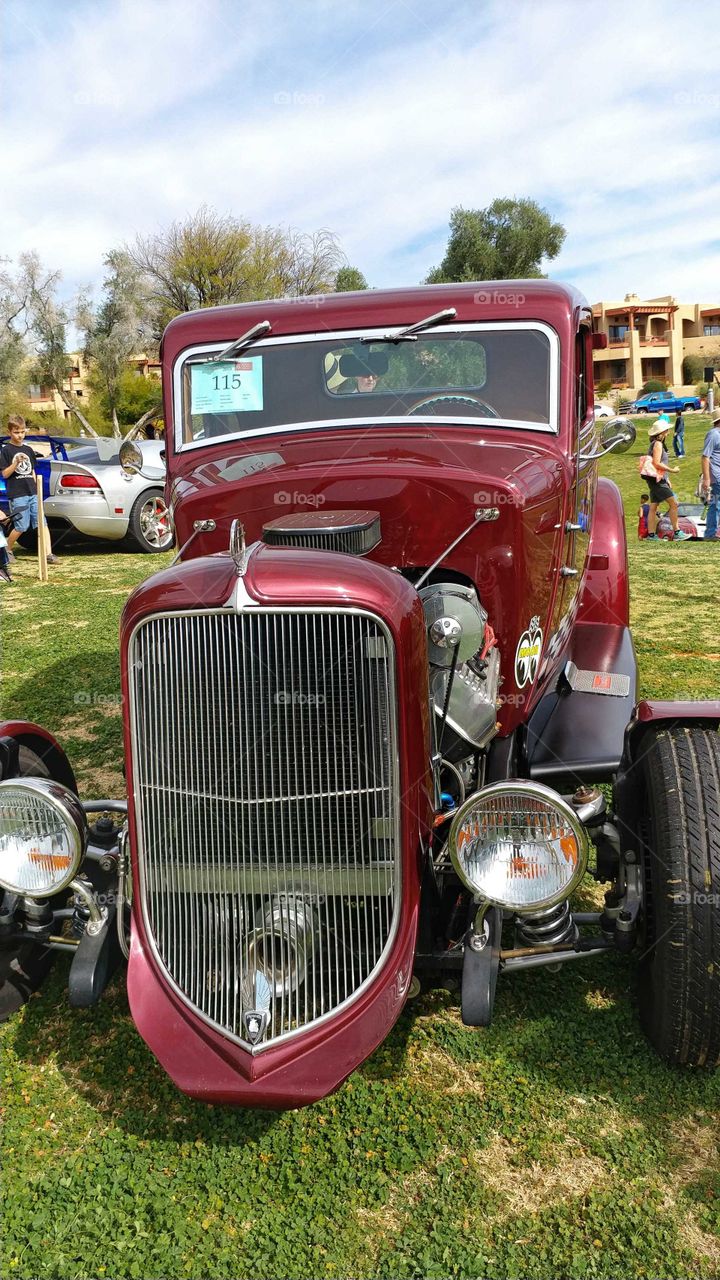 Ruby red Roadster kicking back in a Arizona car show.
