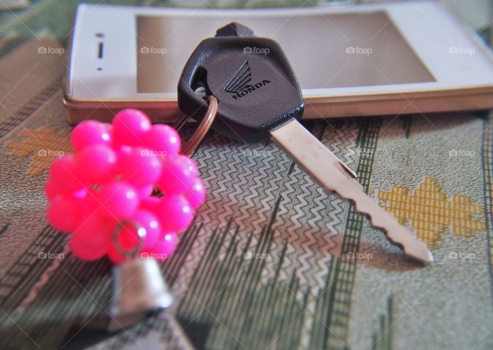Car key and pink key chain