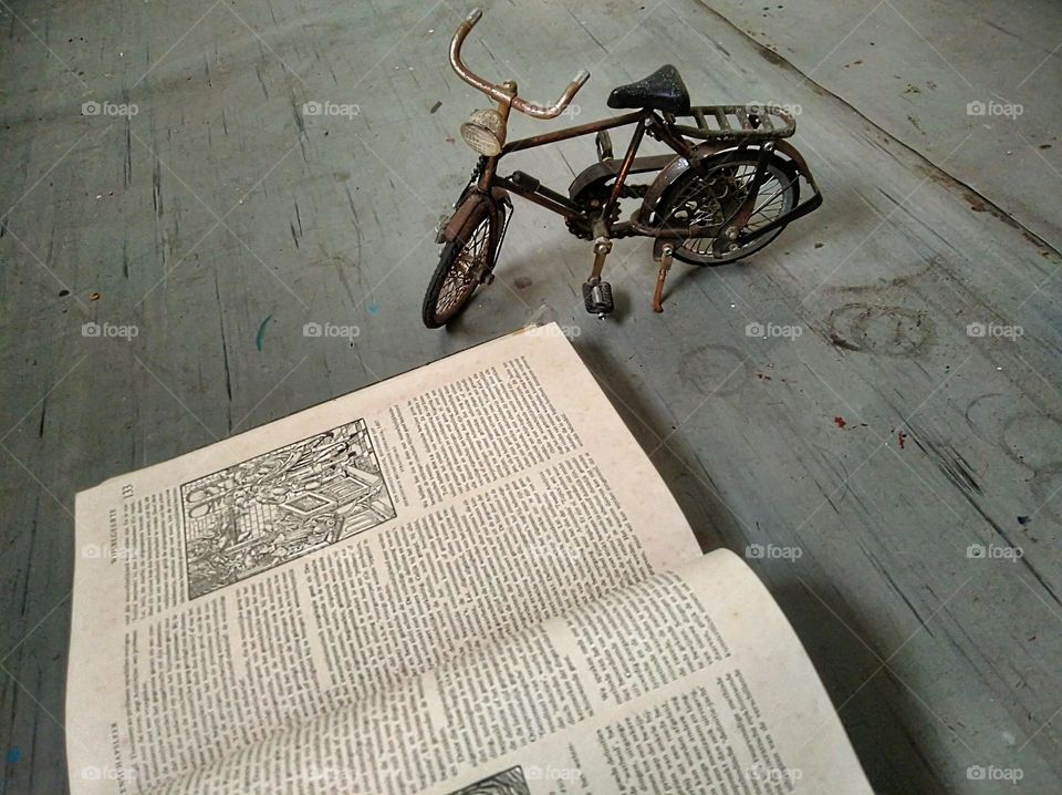 I park my bike and then read the encyclopedia