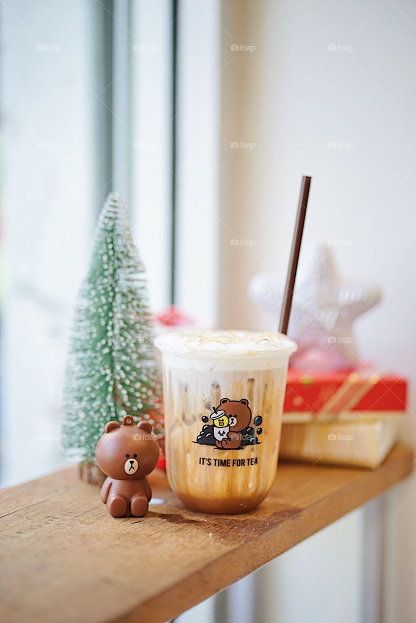 Bangkok - Dec 1, 2019 : A photo of bubble milk tea from the Alley, premium milk tea brand from Taiwan. The Alley is brand collaboration with Line friends for special drink in the festive season.