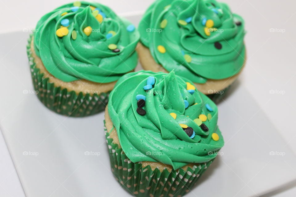 White Cupcakes with Green Buttercream Frosting 