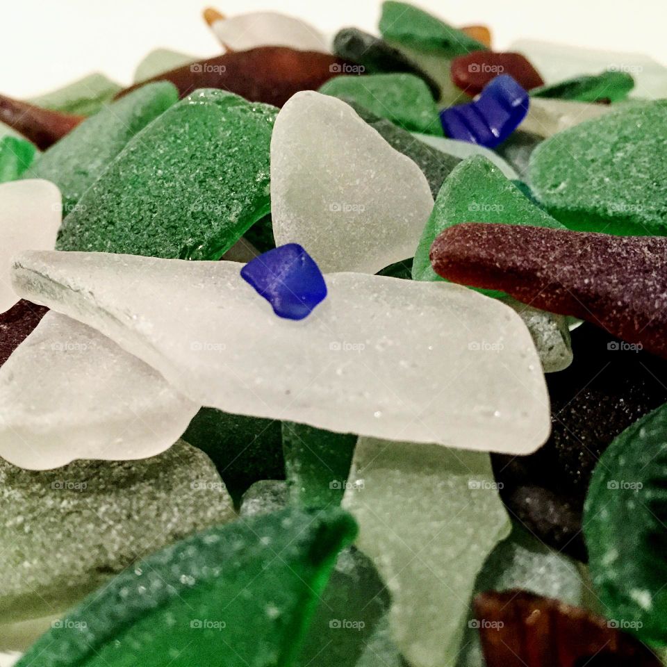 Sea glass, sea glass from the ocean, vacation in the summertime, collecting sea glass on vacation in the summer 