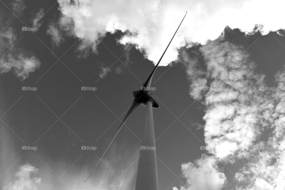 wind turbine on clouds in black and white