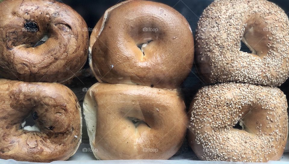 Six Bagels Stuffed with Cream Cheese on Display on a Local Breakfast Street Cart 