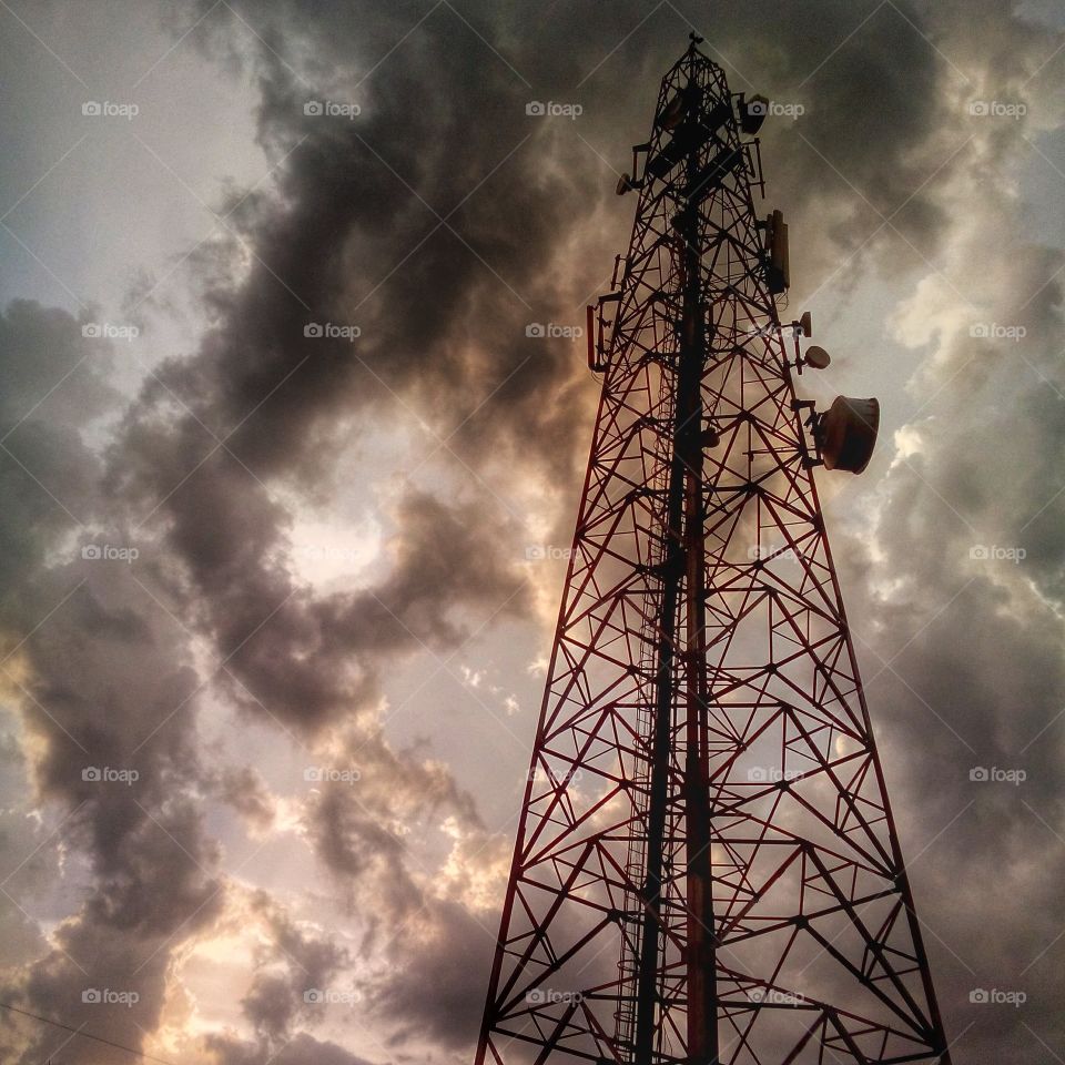 Mobile Tower Silhouette . Photo during pre - rains in Summer...