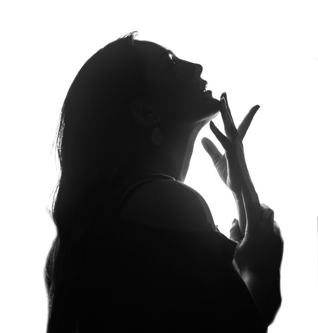 Black and white photo of a women in sillhoute