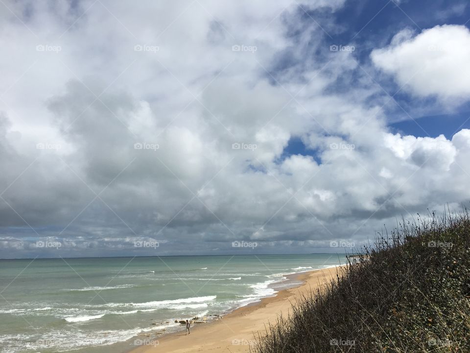 Alone to see beautifulness of nature, wave clouds on coast in France 