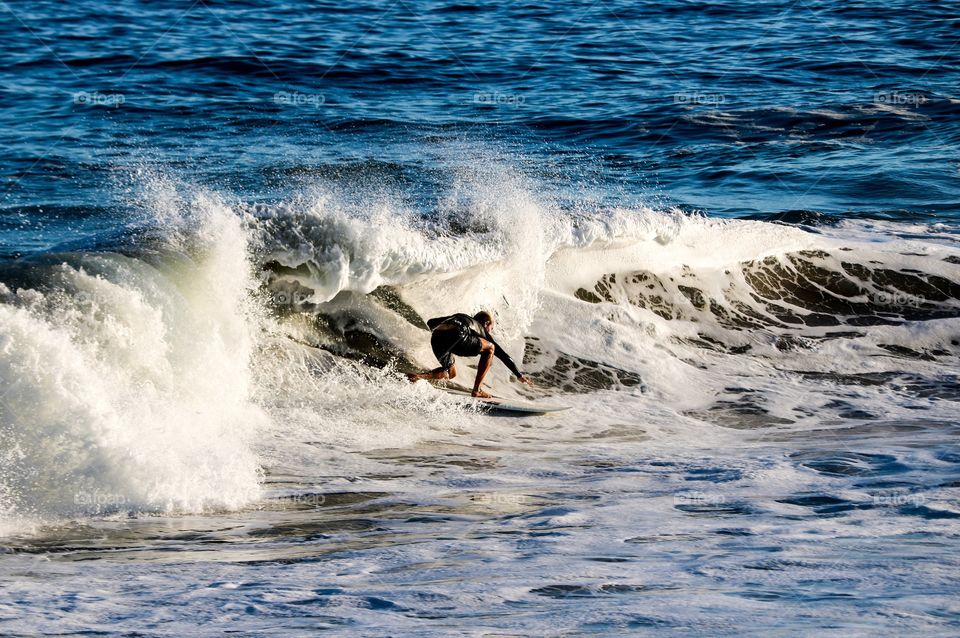 Surfing into sunset at The Wedge, Newport Beach, CA