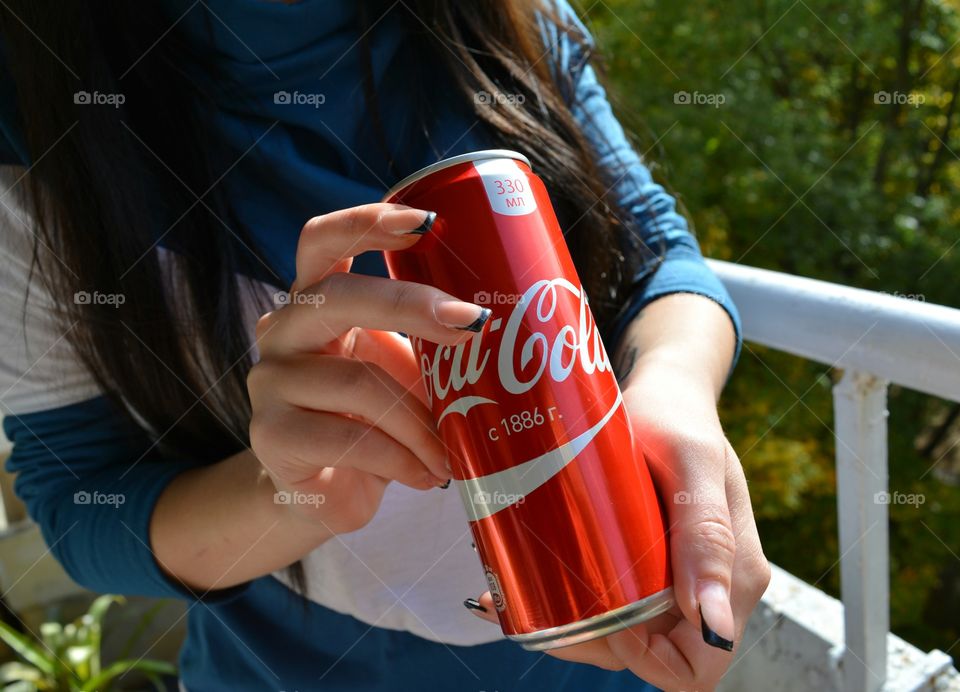 coca cola in hand girl, drinking coca cola