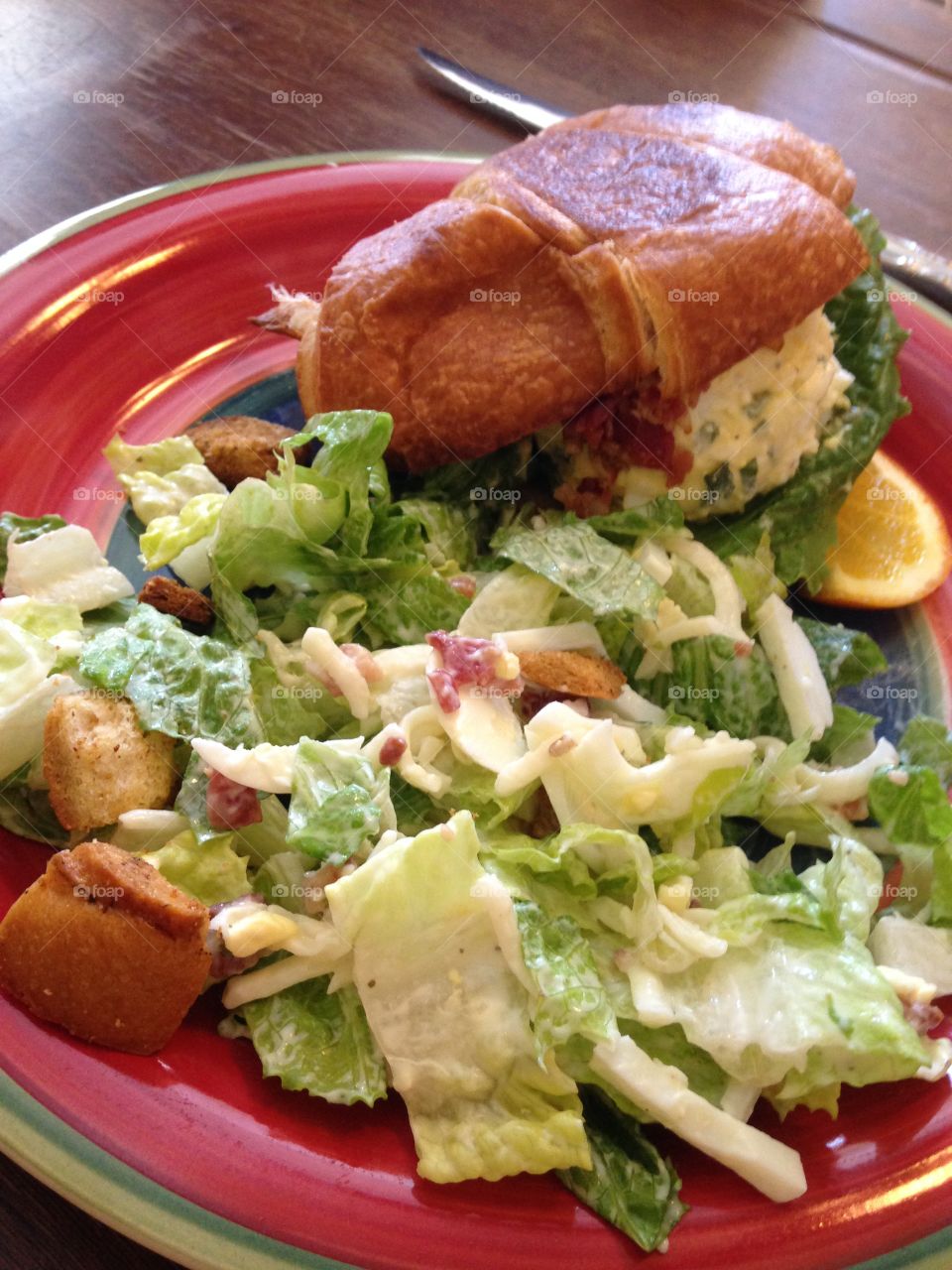 Egg salad croissant and salad