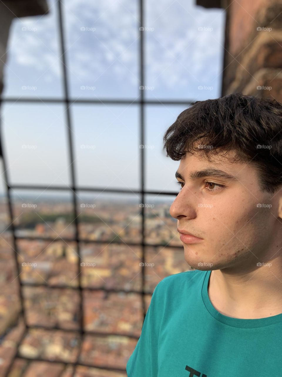 Boy looking panoramic view from top 