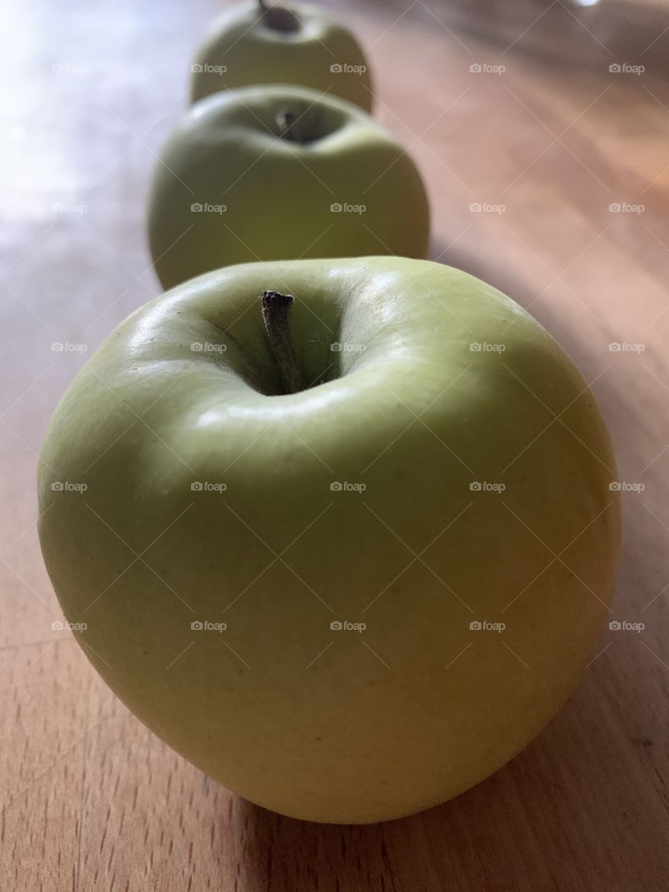 three green apples