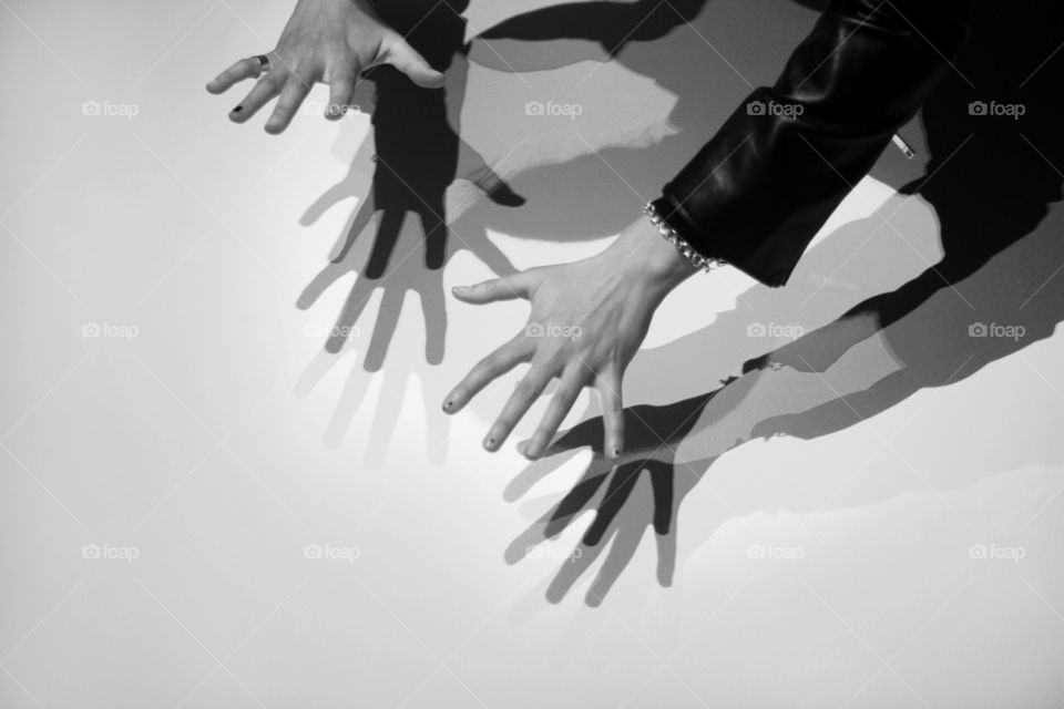 Hands shadows on the wall