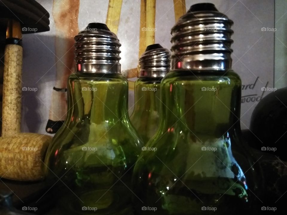 Antique green glass salt and pepper shakers