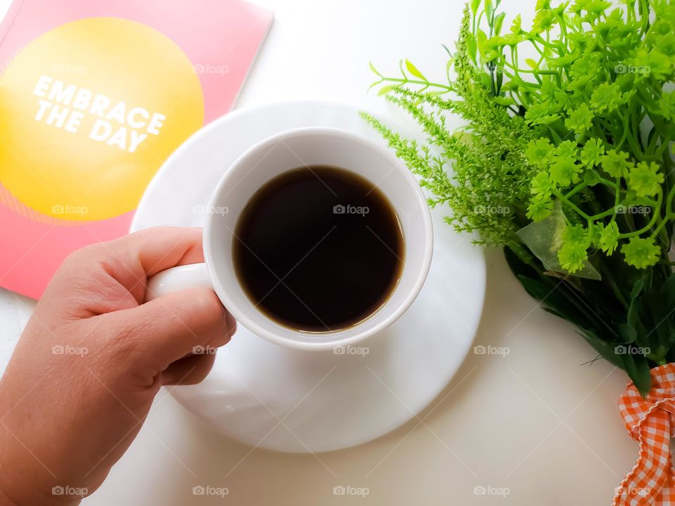 We skip driving to Starbucks and make coffee at home and use a reusable tea cup.