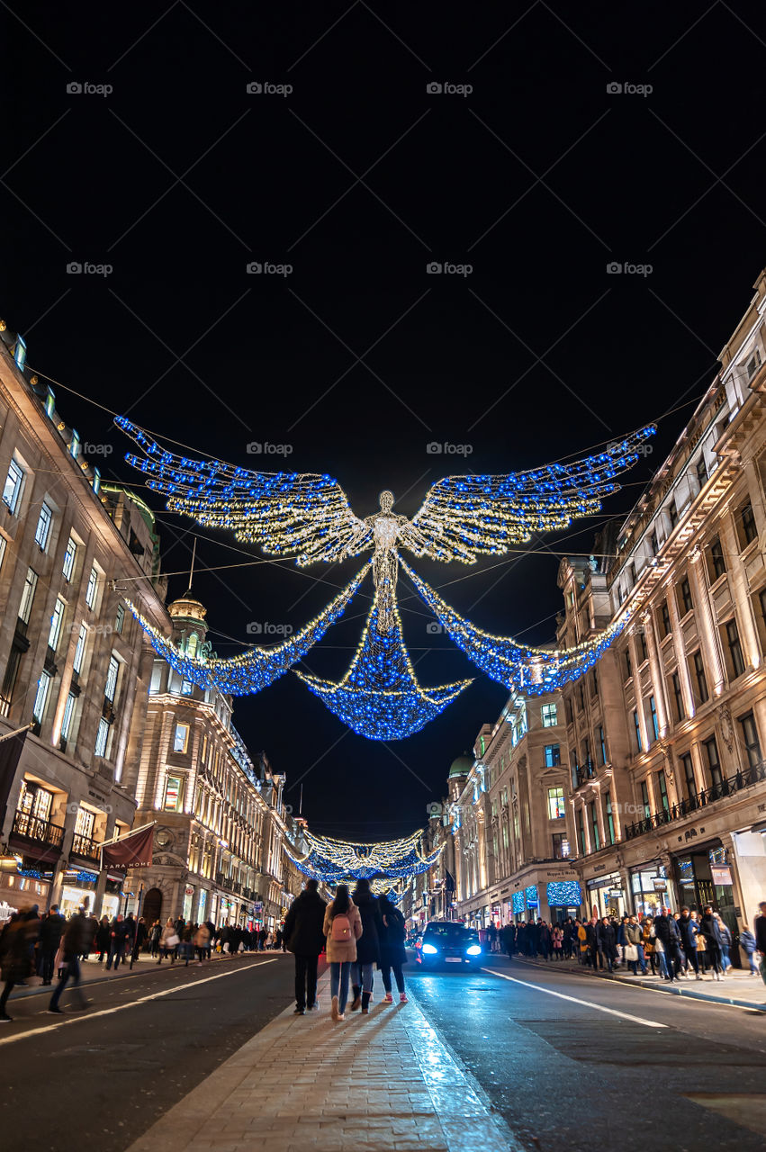 Angel Christmas decoration in Regent's Street, shopping district. December 2019. London. UK.