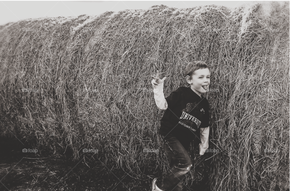 Being silly by the hay bails 