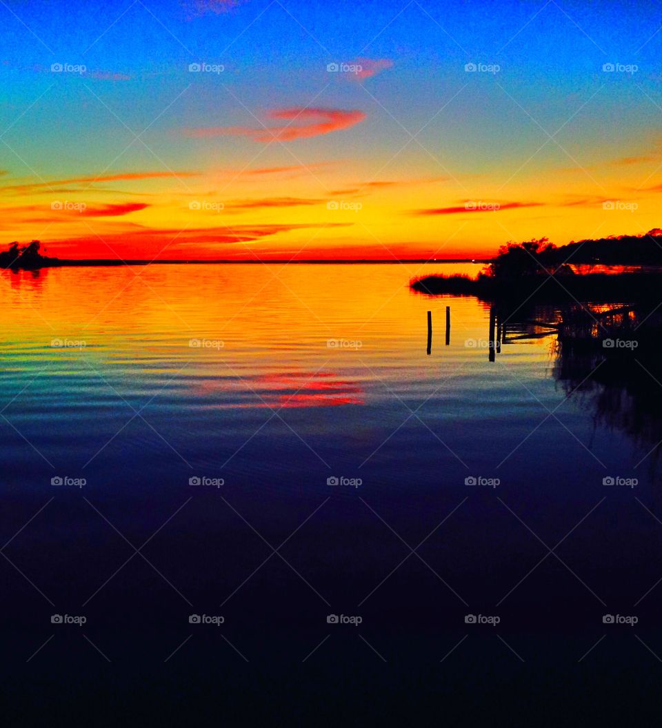Colorful sunset, on jolly bay northwest Florida 