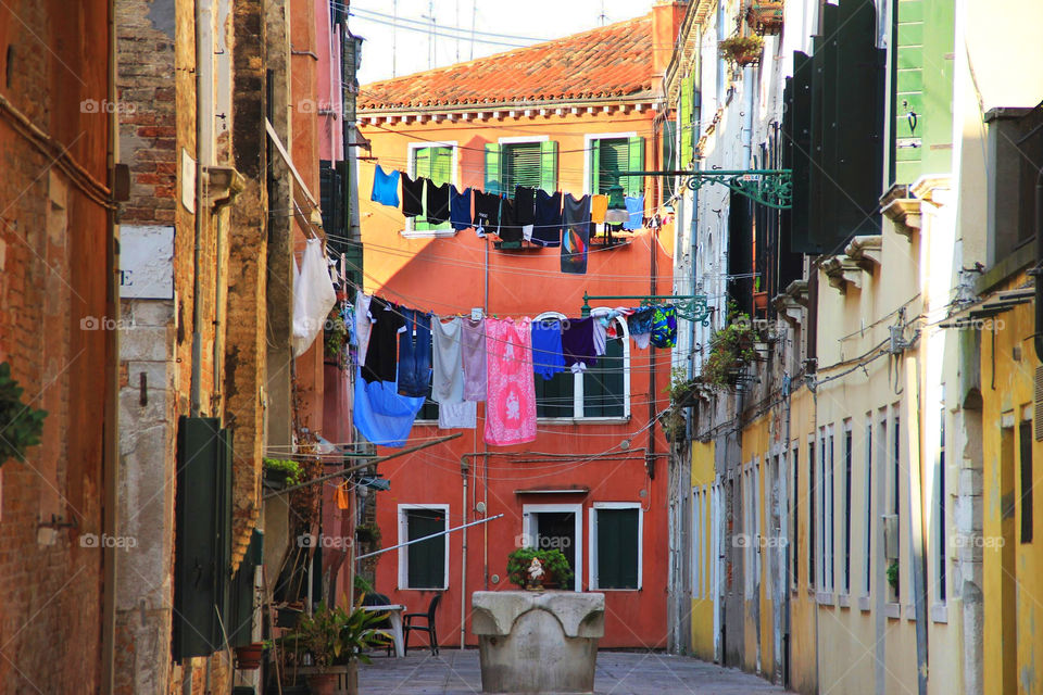 Clothes drying on a small street in Ven ice