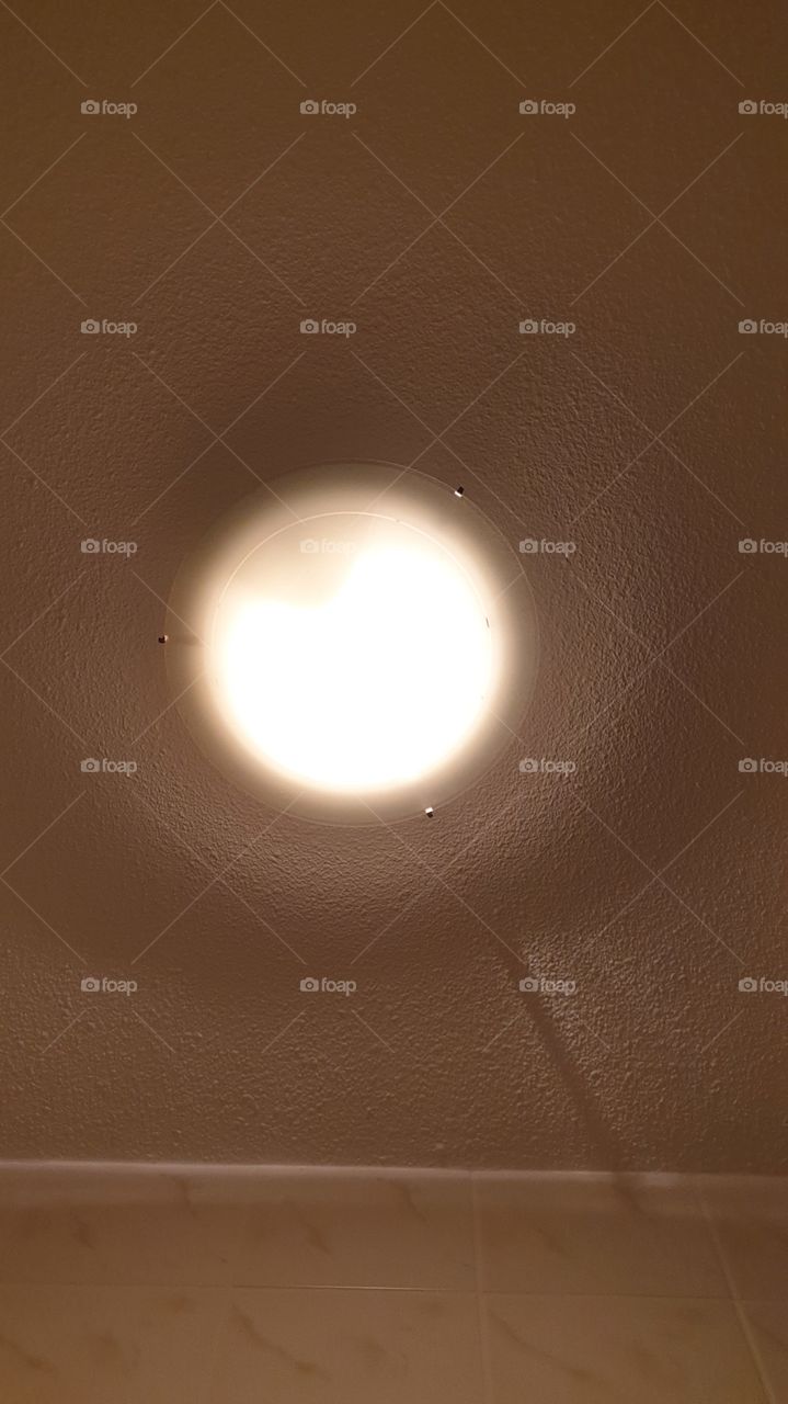 the lamp on the ceiling