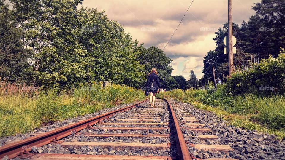 Railway and the lady. gone with the wind