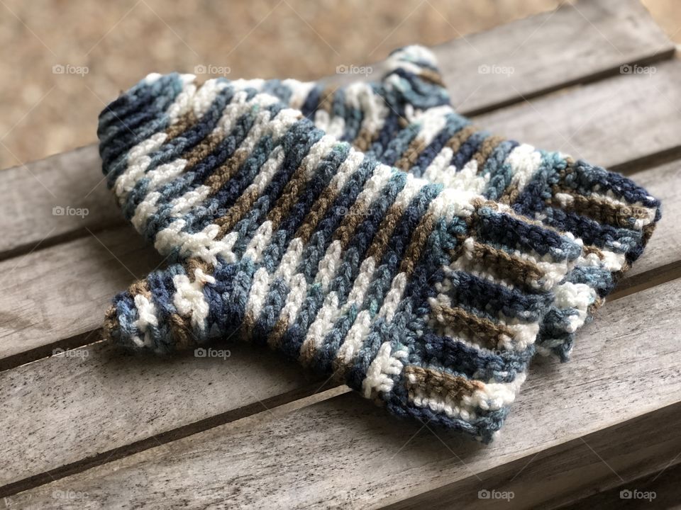 Handmade multicolored crocheted winter mittens