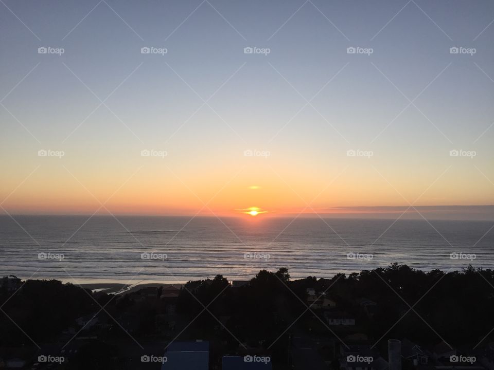 Beach sunset from on top of a cellular tower