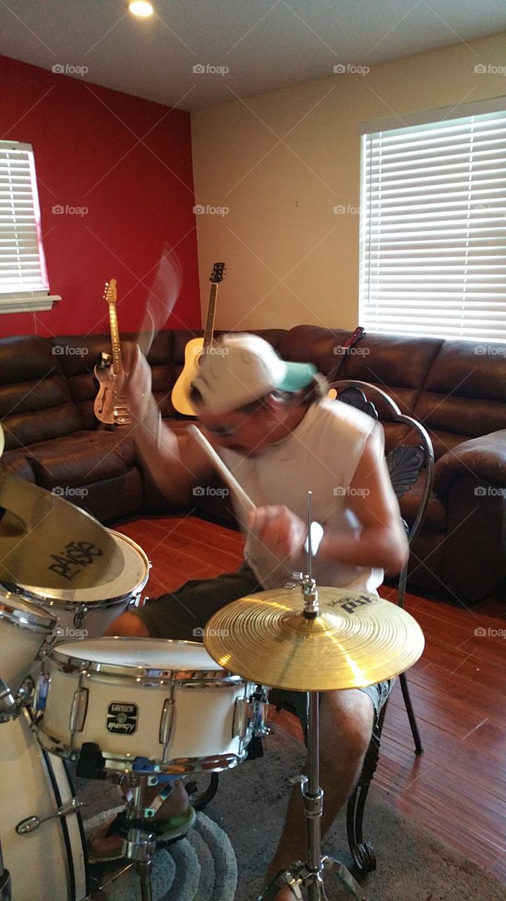 Drummer Action. Practicing drums.