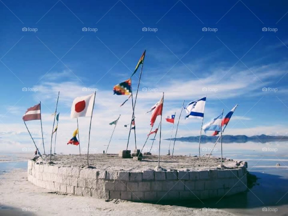 flags in bolivian salt flats