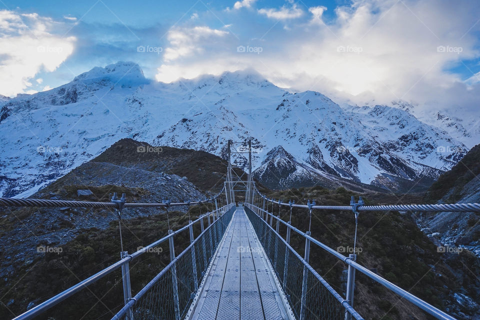 Suspension bridge facing Mt Sefton in Aoraki/Mt Cook National Park, New Zealand