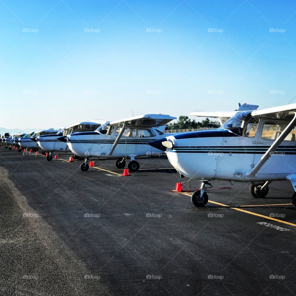 Rental airplanes lined up at Paine field in Washington state just a half hour from downtown Seattle. This is a nice airport where being builds their 757 passenger planes 
