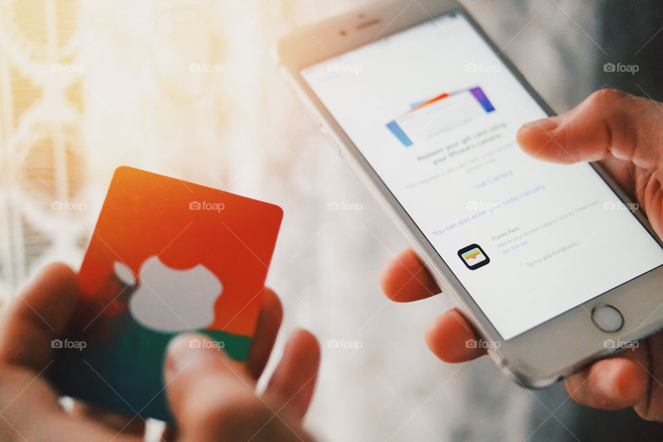 Redeeming an Apple gift card code...