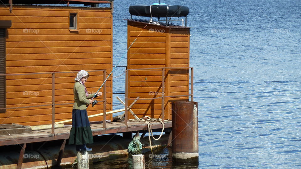 girl with a fishing rod