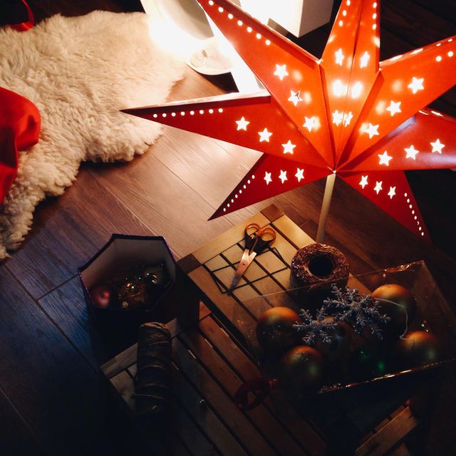 Home Christmas decorating process. Christmas red star