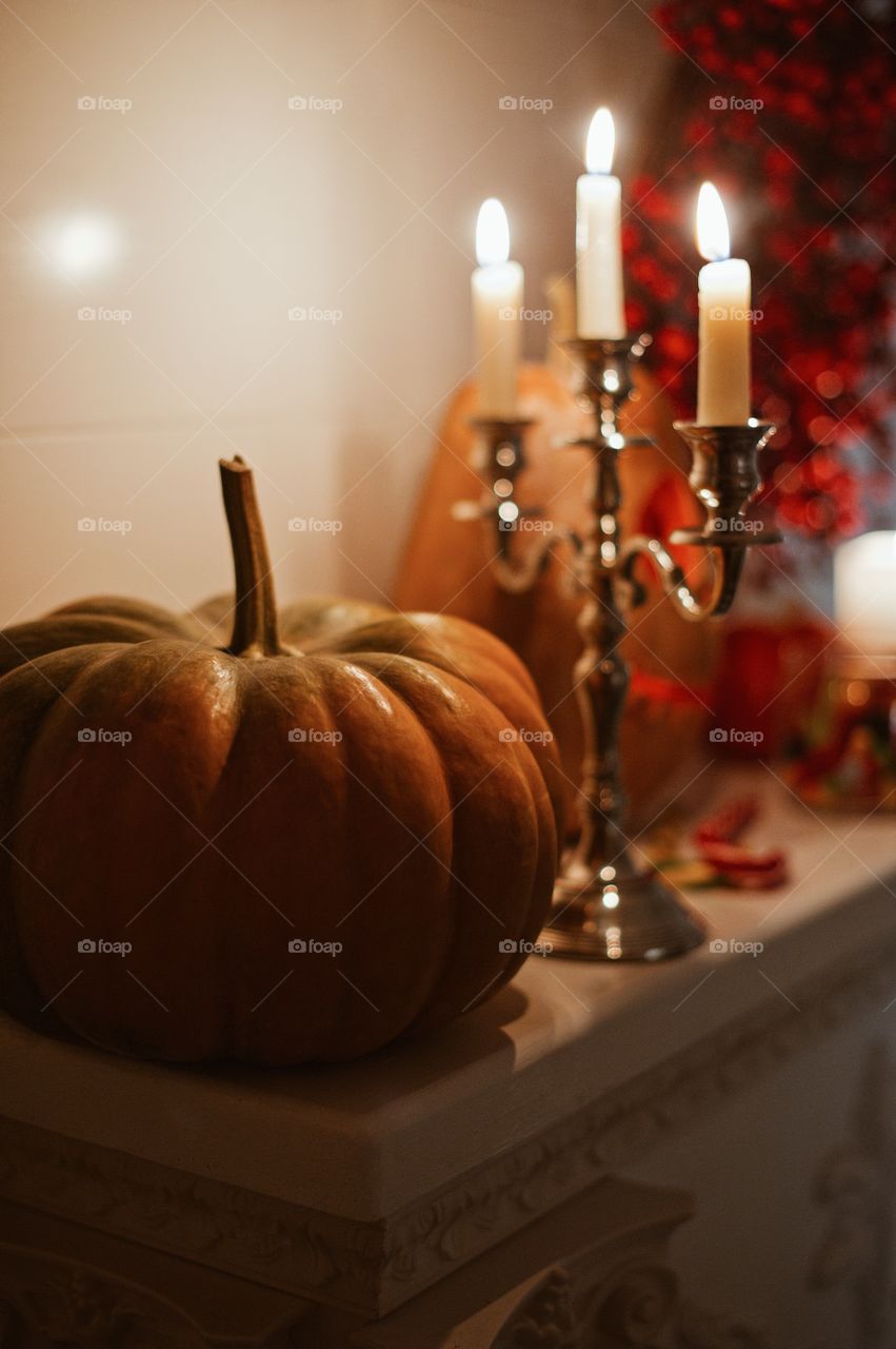 Close-up of halloween pumpkin with candles