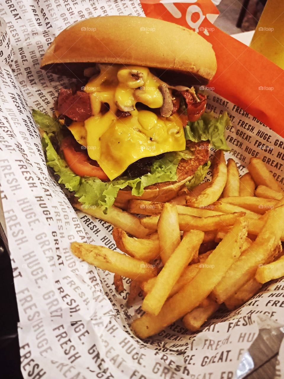 Mouth-watering fries and cheeseburger in one photograph.