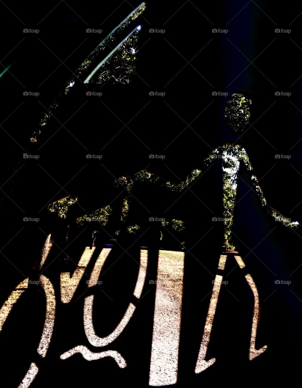 Park behind the metal sign 