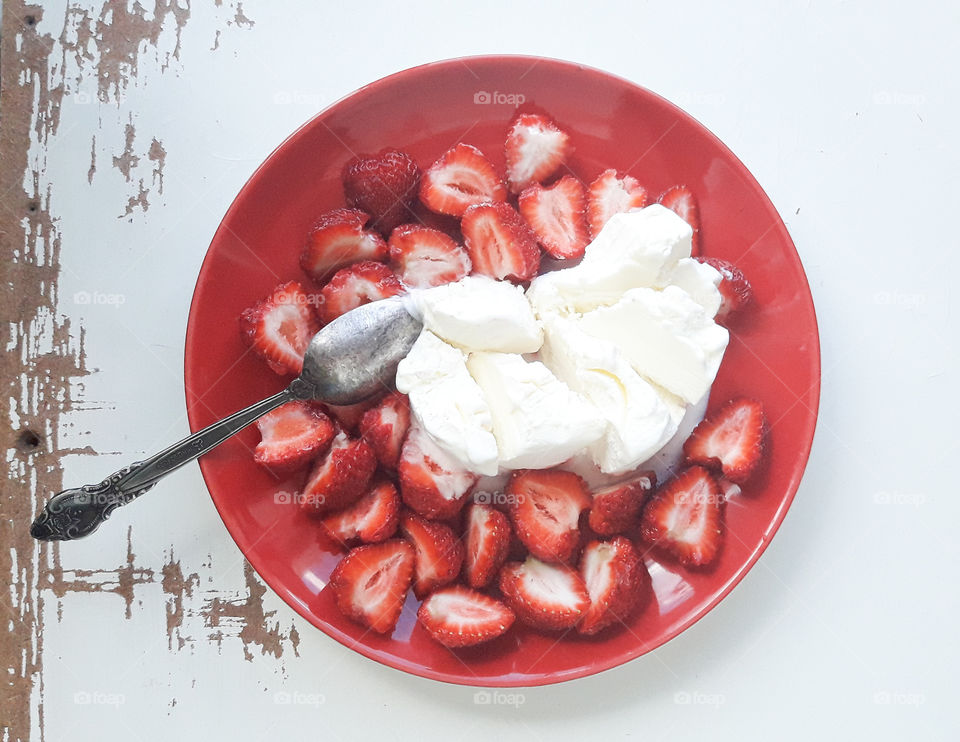 strawberries with icecream flatlay