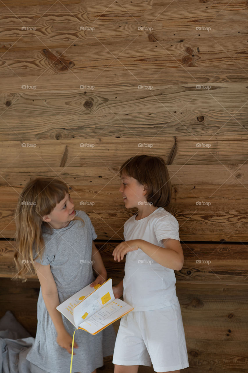 Brother and the sister are happy to get happyself journal.